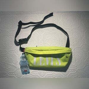 Levi’s Crossbody Bag in Neon Yellow NWT but has small markings from storage